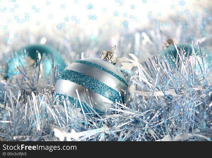 Blue Christmas: Cool blue and silver ornaments nestled among some coordinating garland with space for copy. Blue Christmas: Cool blue and silver ornaments nestled among some coordinating garland with space for copy.