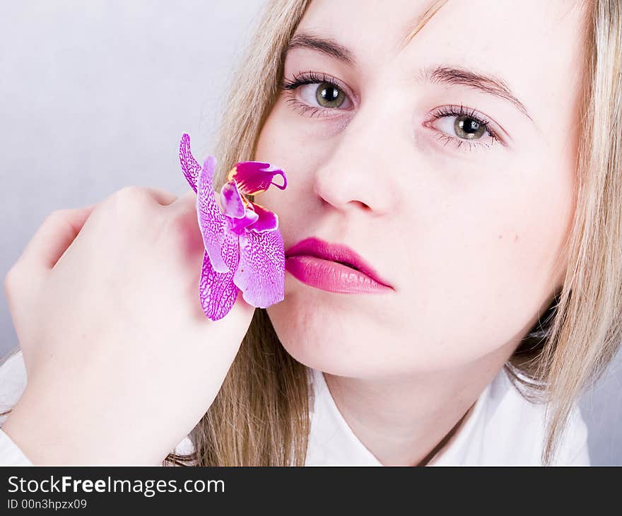 Blonde Woman With Orchid