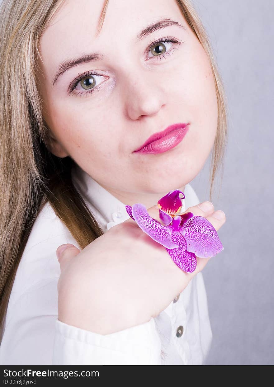 Blonde Woman With Orchid