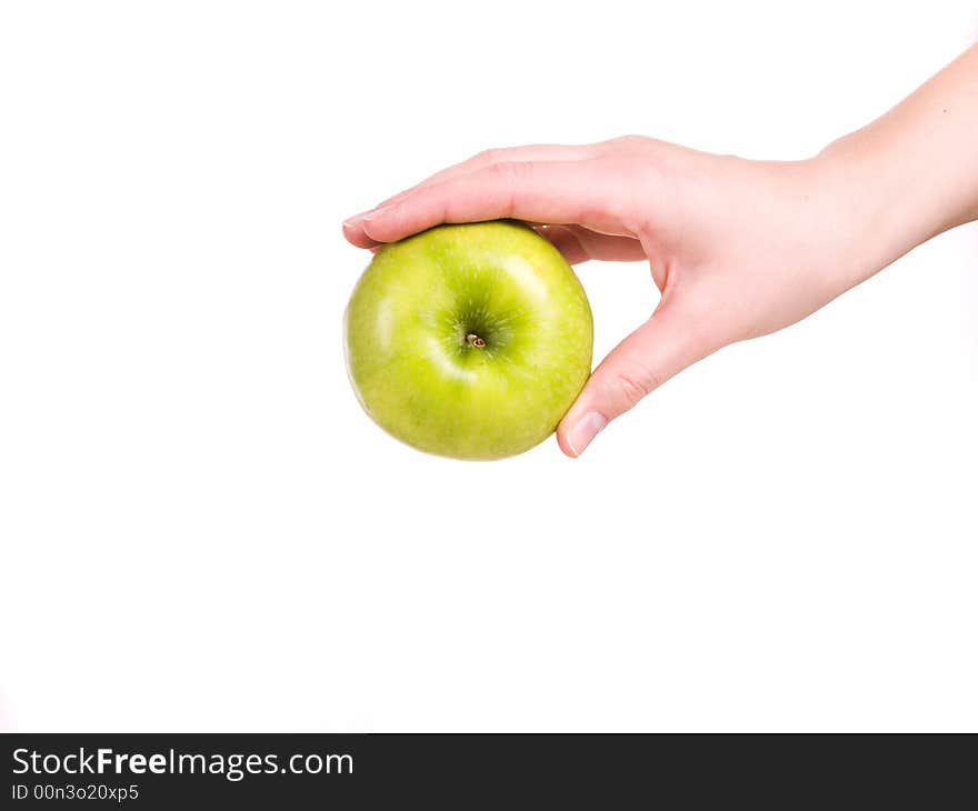 Woman holding a green apple in her hand. Woman holding a green apple in her hand