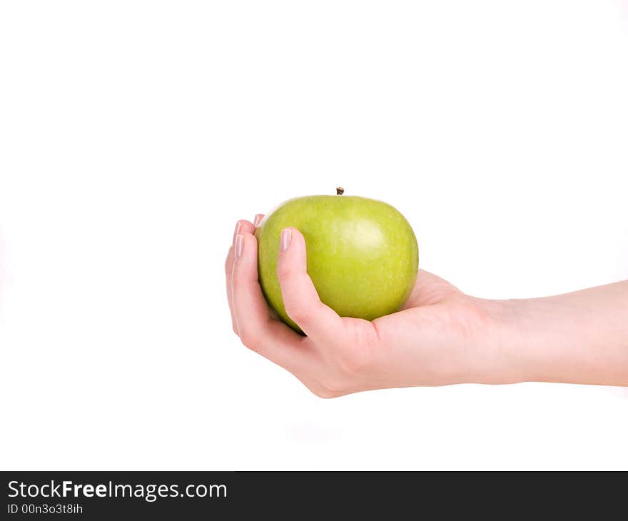 Green apple in hand