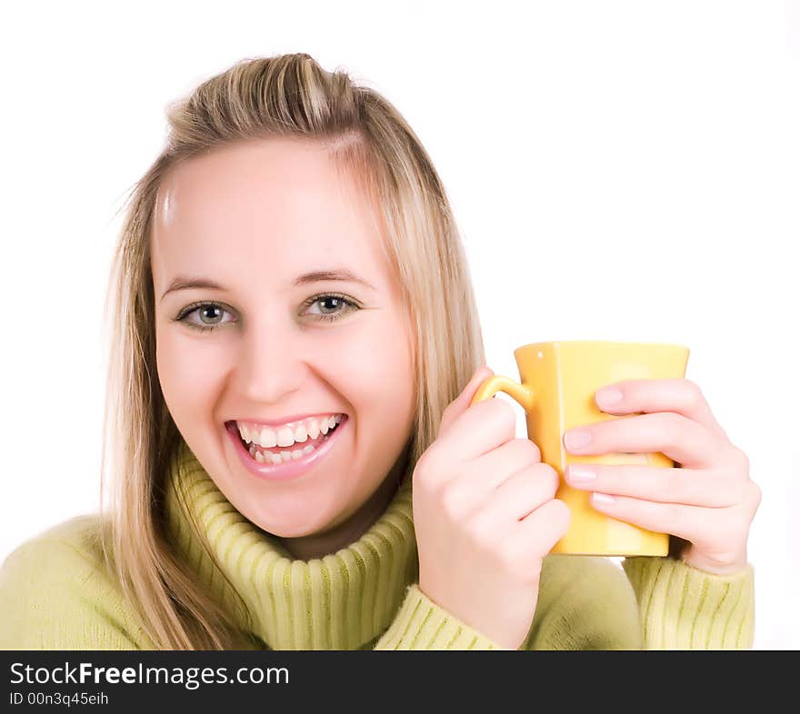 Smilling young woman with cup of tea