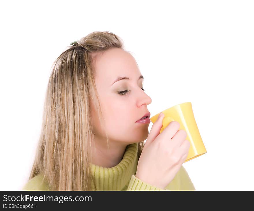 Young woman drinking hot tea