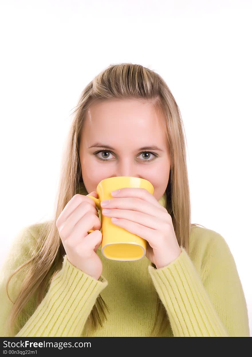 Young woman drinking hot tea