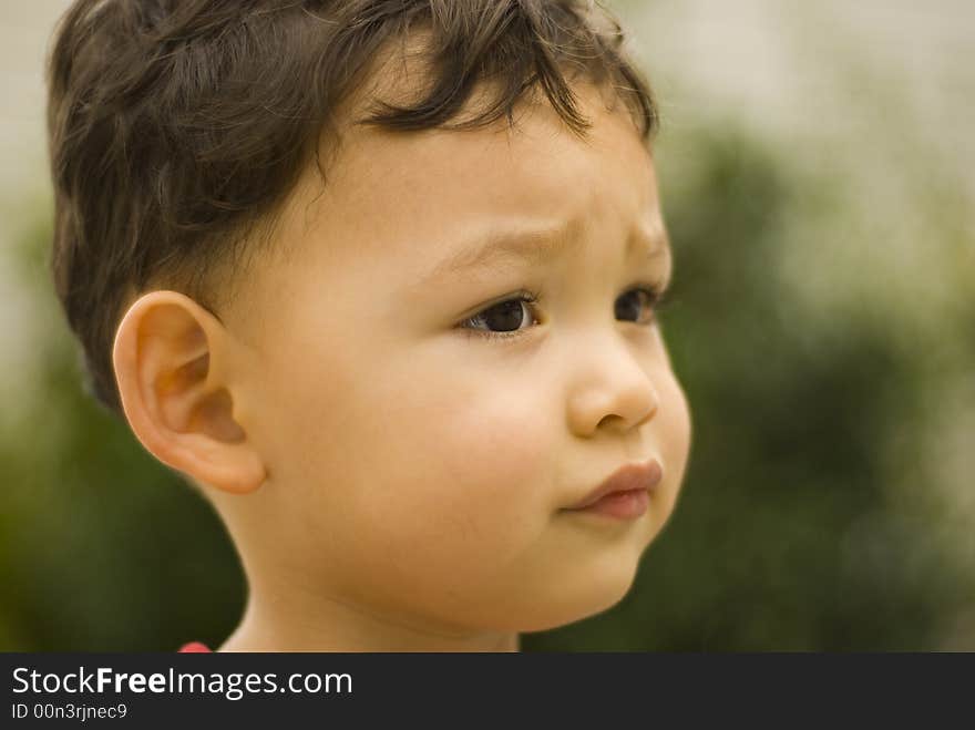 Portrait of a baby boy where focus is only centered around the left eye. Portrait of a baby boy where focus is only centered around the left eye