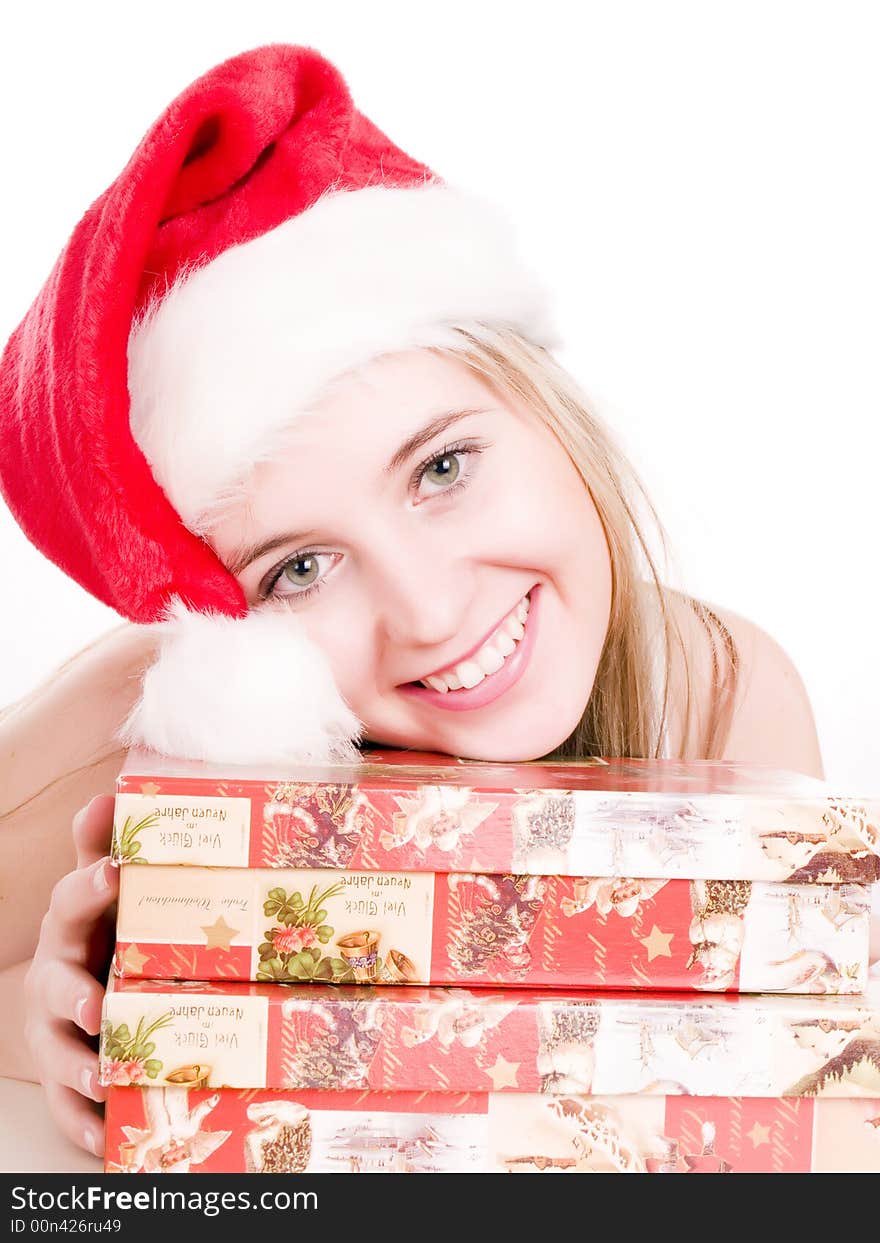 Attractive woman holding christmas gifts.