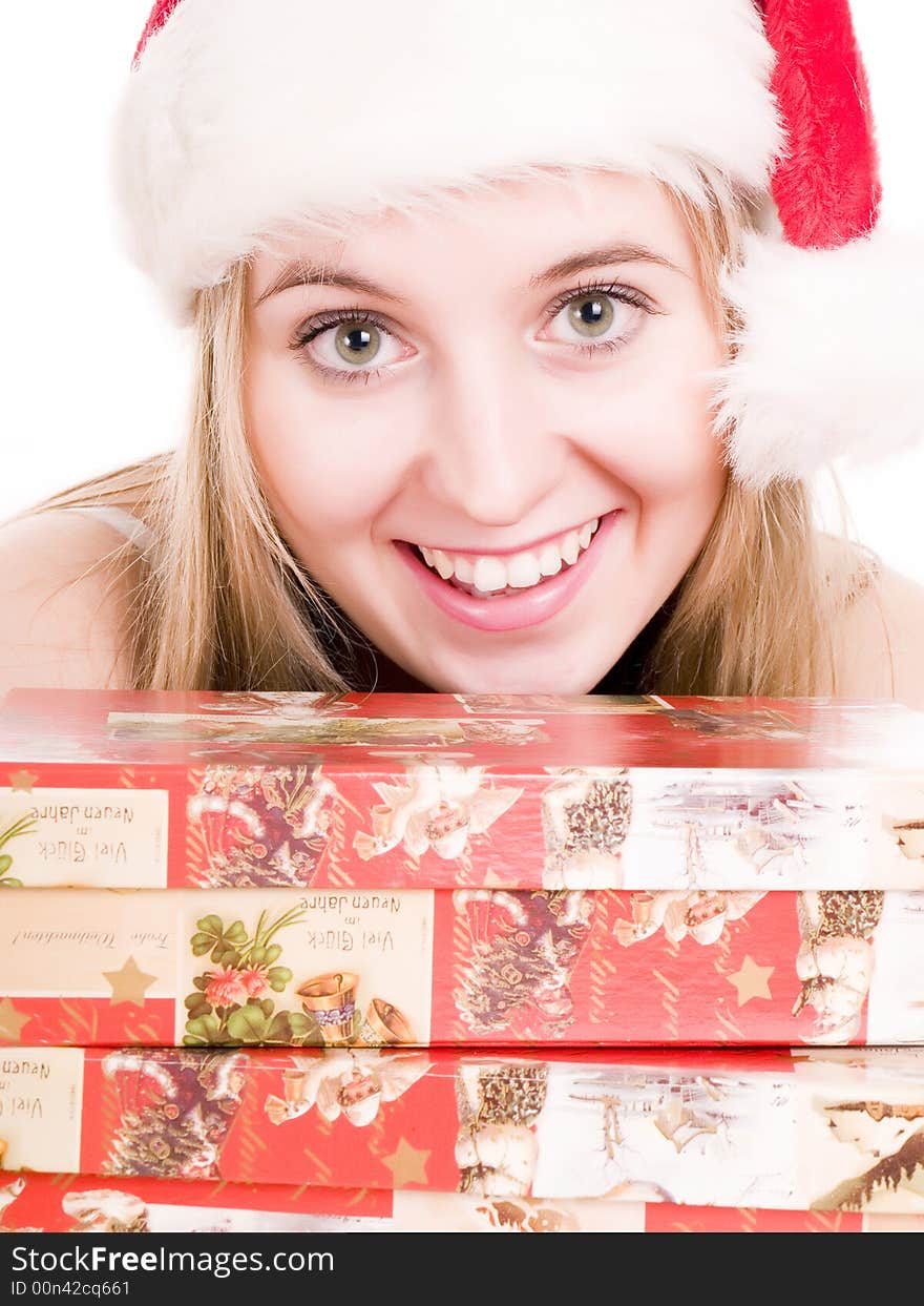 Smilling girl and gifts.