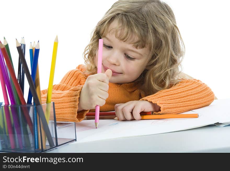 Beautiful little girl with pencils