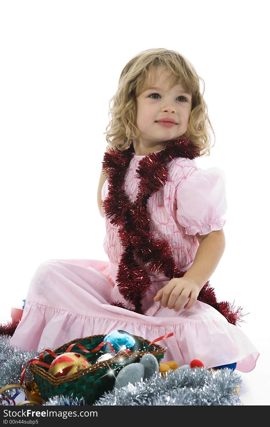 Beautiful little girl with christmas decoration on isolated background