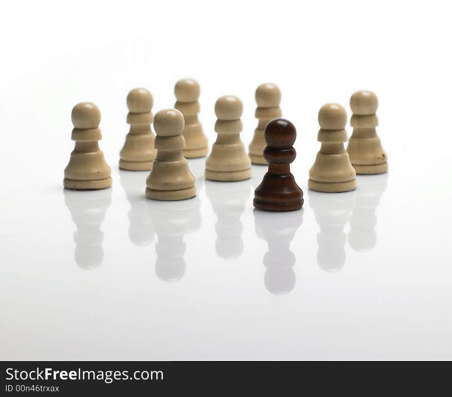 Chess pawns / standing out of the crowd