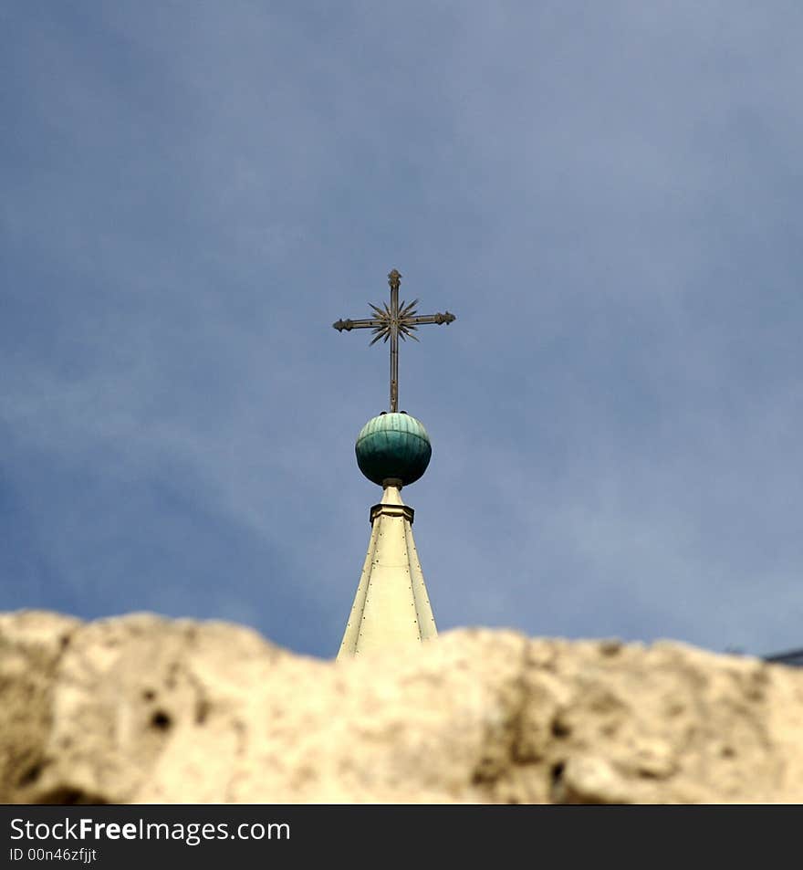 City of Arekipa in Peru - tourists attraction - cross on a blue sky. City of Arekipa in Peru - tourists attraction - cross on a blue sky