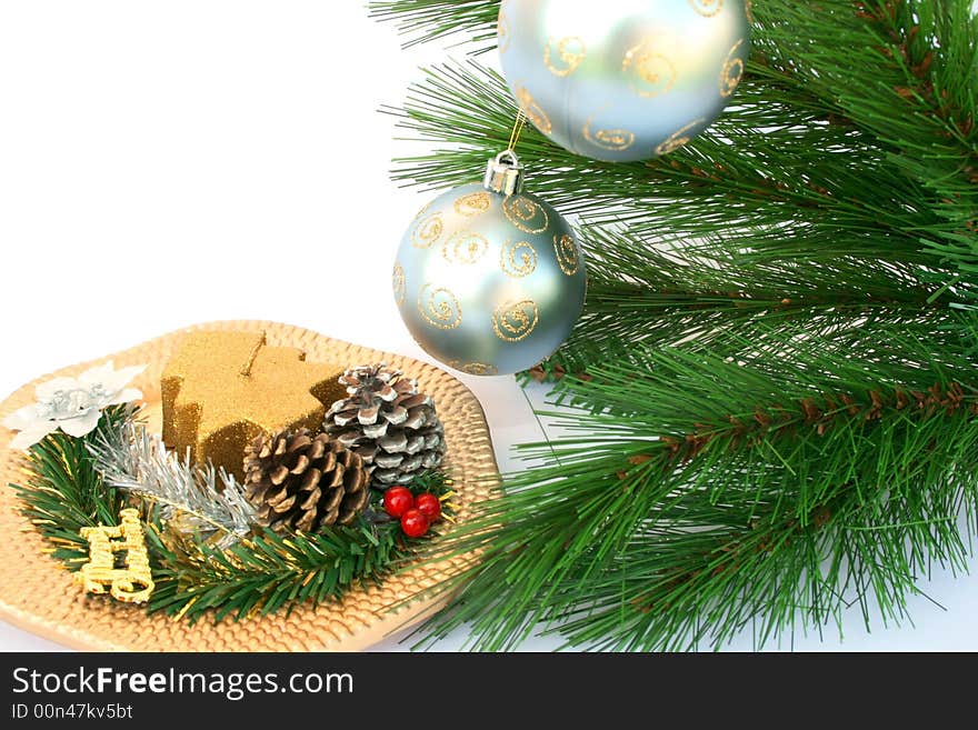 Christmas ornaments.Gray balls,fir-tree,cones,candle,holly berry.