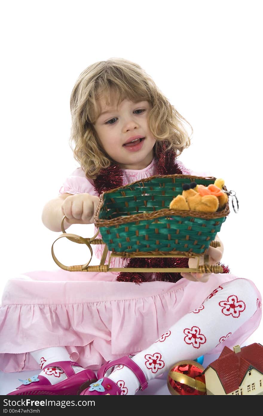 Beautiful little girl with christmas decoration on isolated background