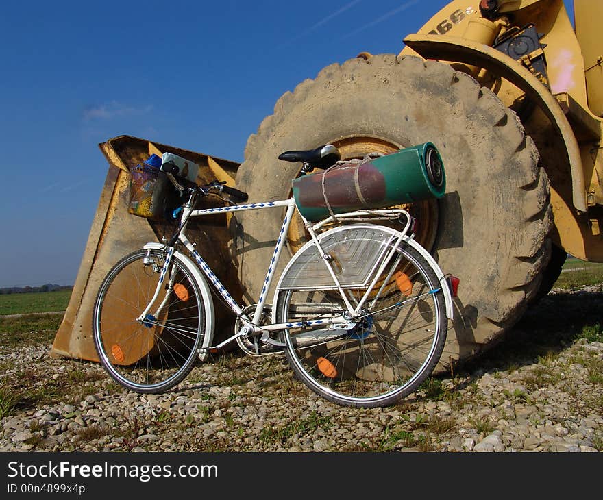 A detail view of an caterpillar with a bike. A detail view of an caterpillar with a bike.