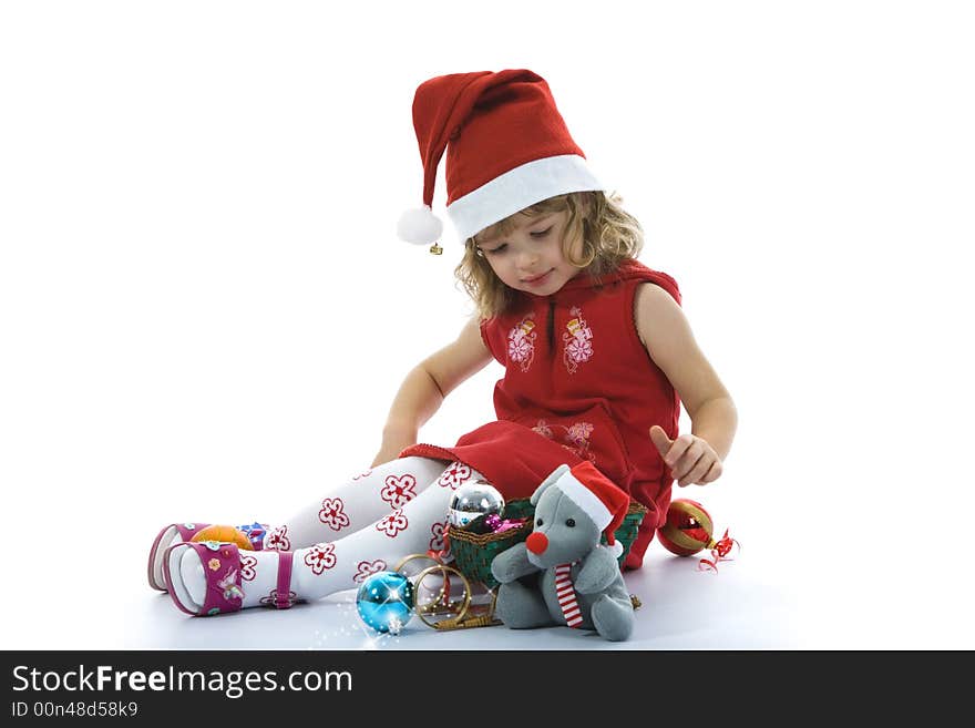 Beautiful little girl with christmas decoration on isolated background