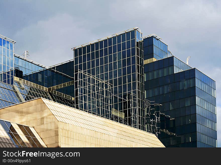 Business building with blue glass and reflections. Business building with blue glass and reflections