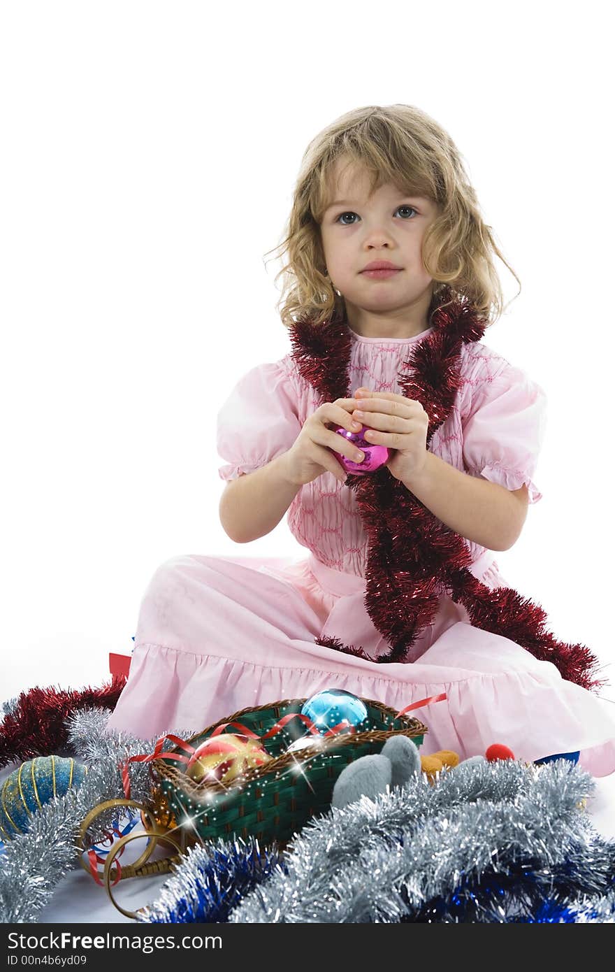 Beautiful little girl with christmas decoration on isolated background