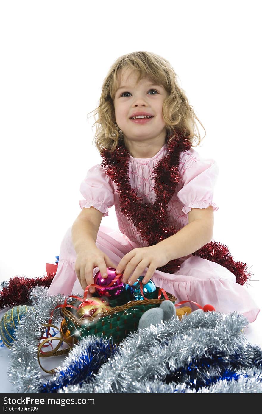 Beautiful little girl with christmas decoration on isolated background