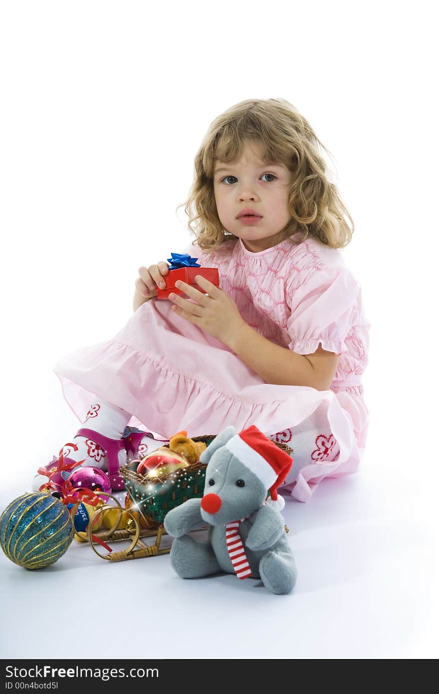 Beautiful little girl with christmas decoration on isolated background