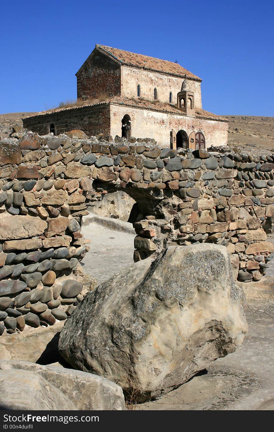 Georgian church with a wall in front of it