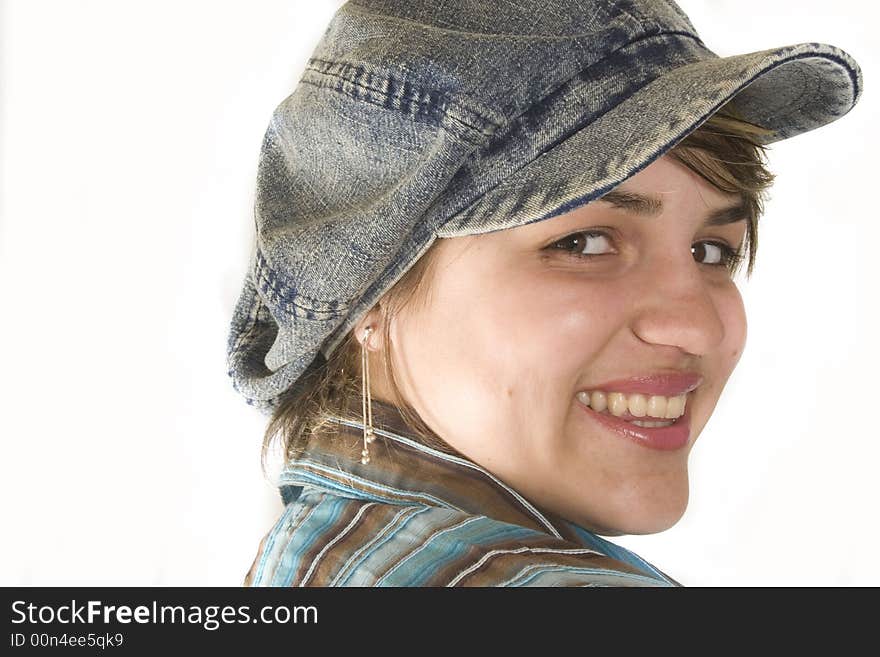 Portrait of a young attractive woman with cap