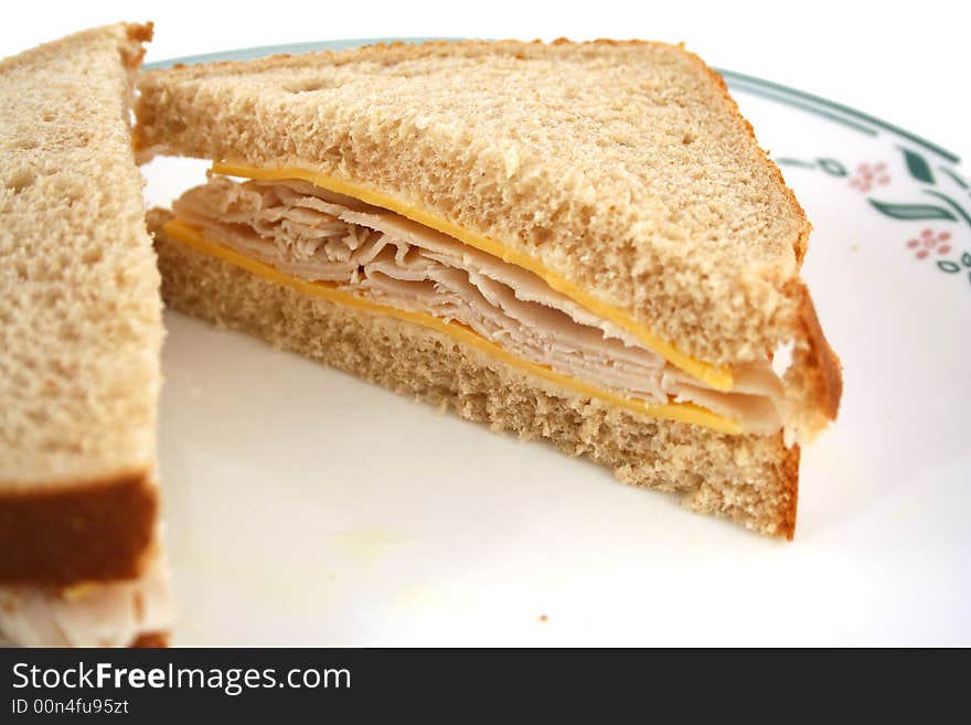 Isolated  Turkey Sandwich on Whole Grain Bread