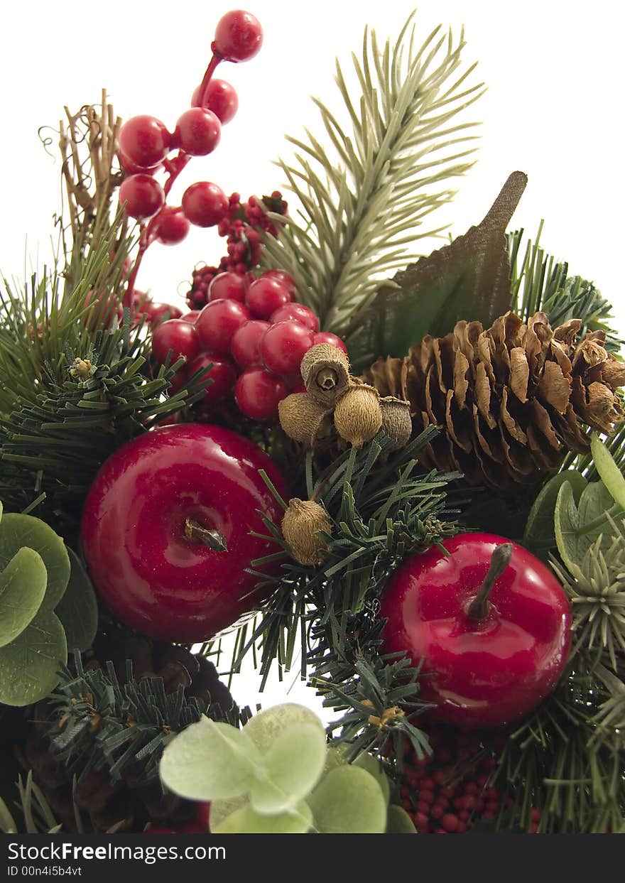 Fragment of christmas wreath on white background