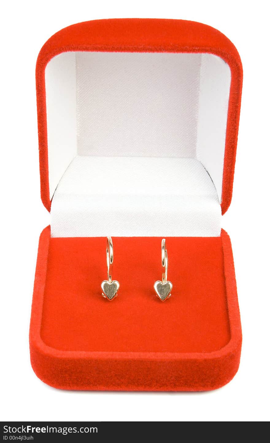 Earrings in red box. Isolate on white.