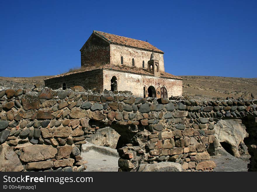 Georgian church with a wall in front of it