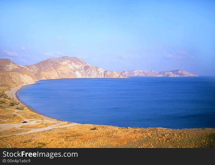 Sea on a background of mountains