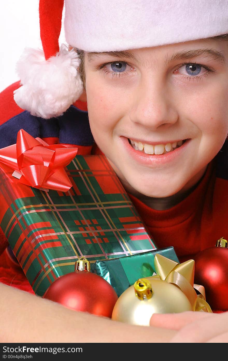 Shot of a young boy with presents - Merry Christmas. Shot of a young boy with presents - Merry Christmas