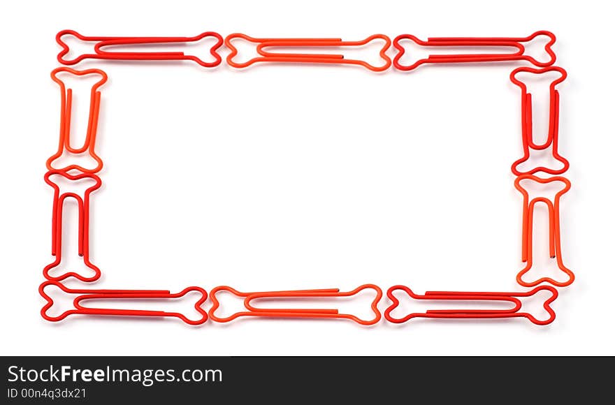 Colored bone-shaped paper clips isolated on white forming a frame