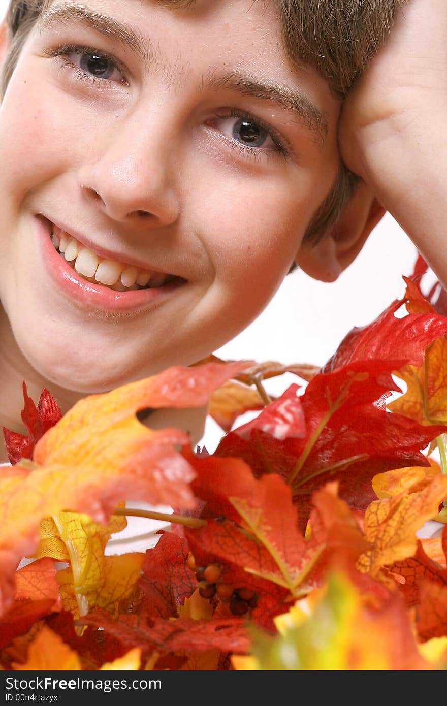 Shot of a young boy - Fall leaves headshot