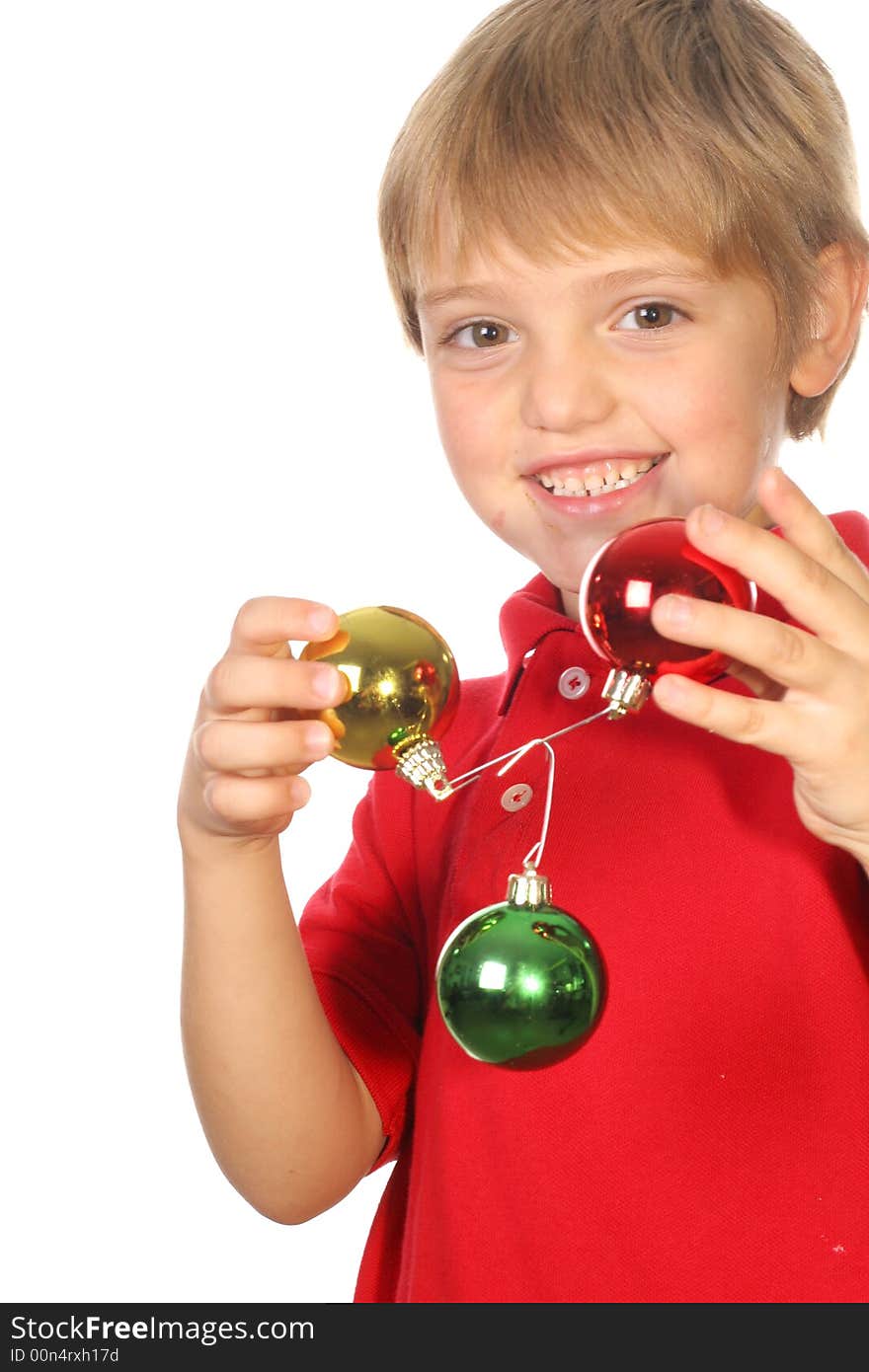 Child with christmas ornaments