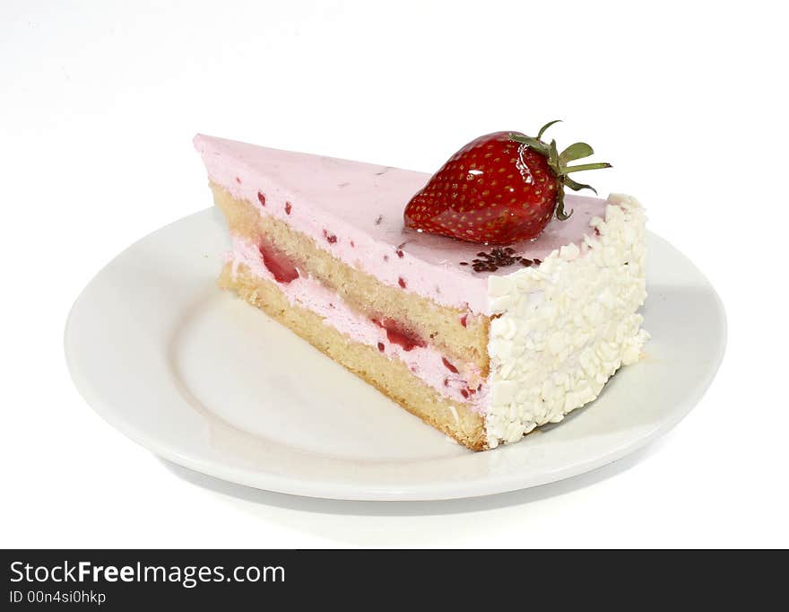 Tasty cake with cream and with fresh strawberries