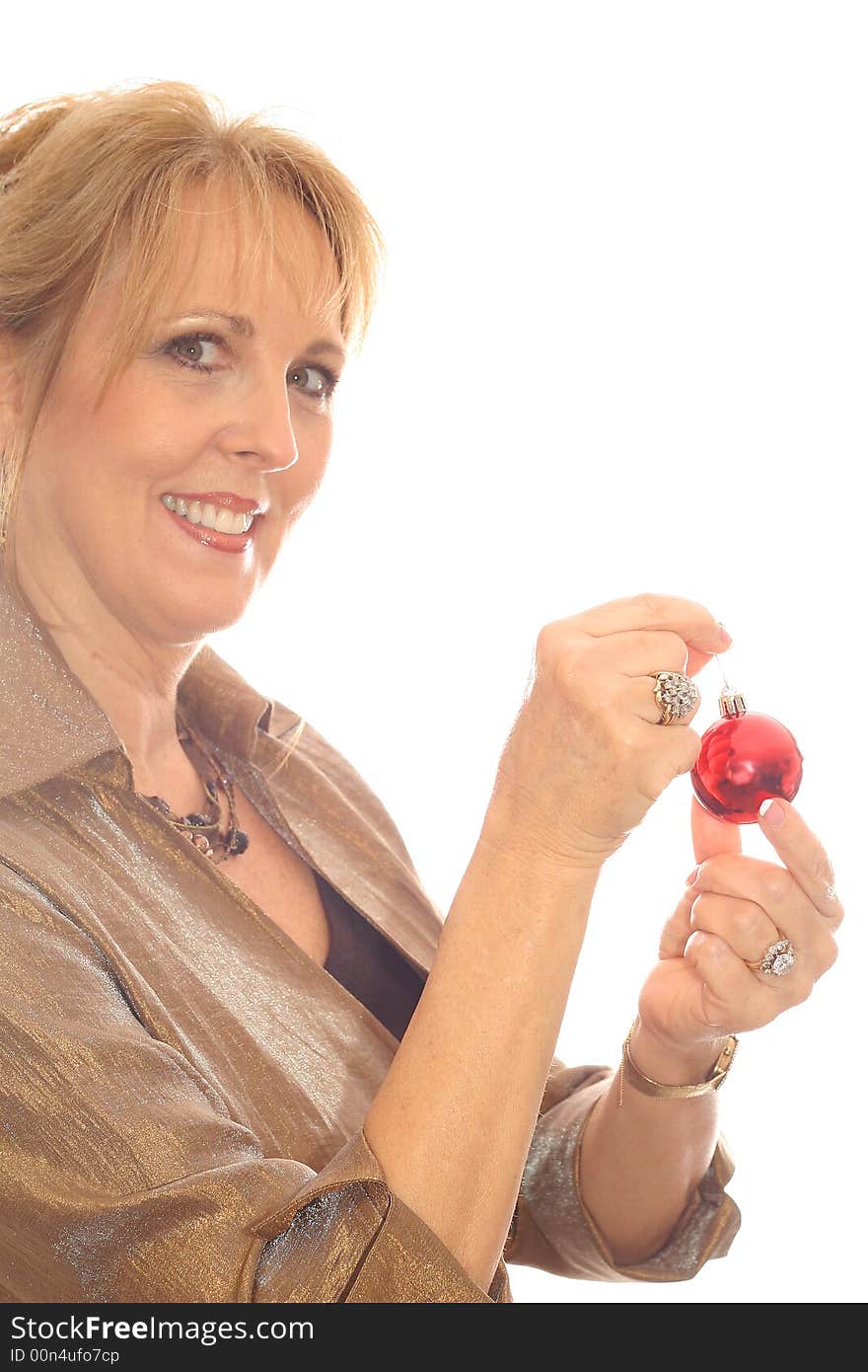 Shot of a woman with Christmas ornament side