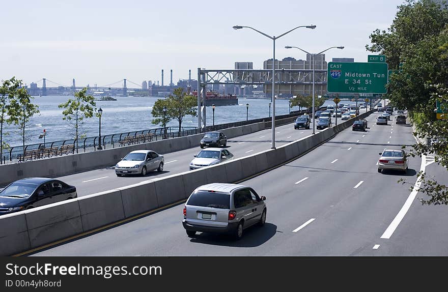 View on the traffic on FDR Drive, downtown Manhattan and East River