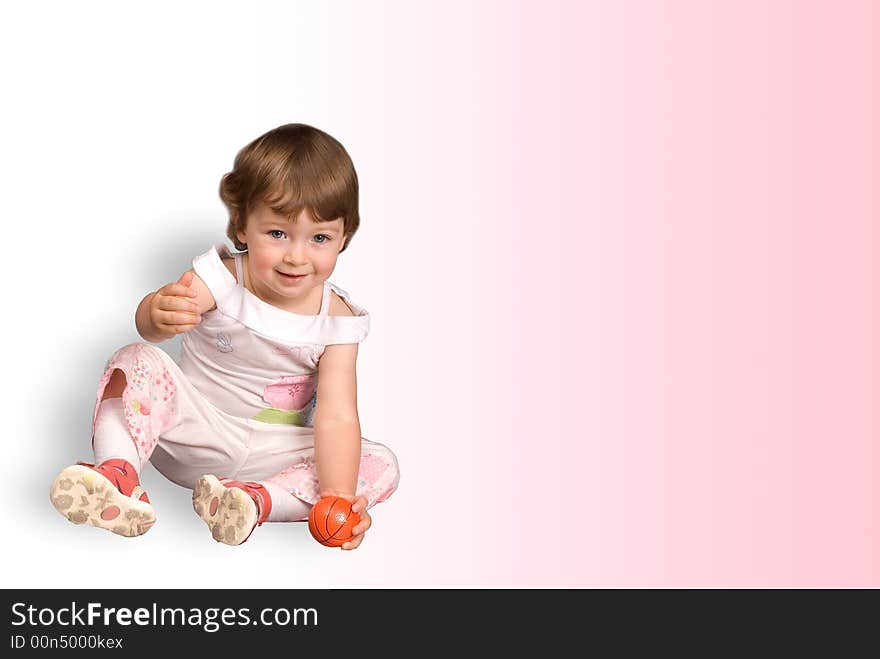 The beautiful girl sits with a ball. The beautiful girl sits with a ball