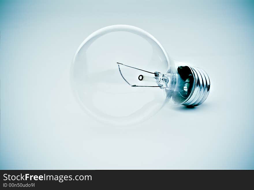 Contrasty lightbulb in a subtle electric blue hue. Contrasty lightbulb in a subtle electric blue hue