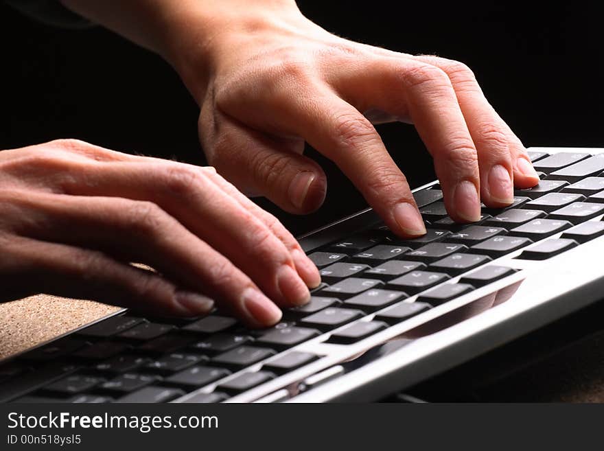 Woman hands typing