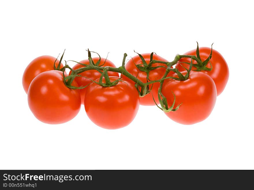 Fresh bunch of tomatos isolated on a white background