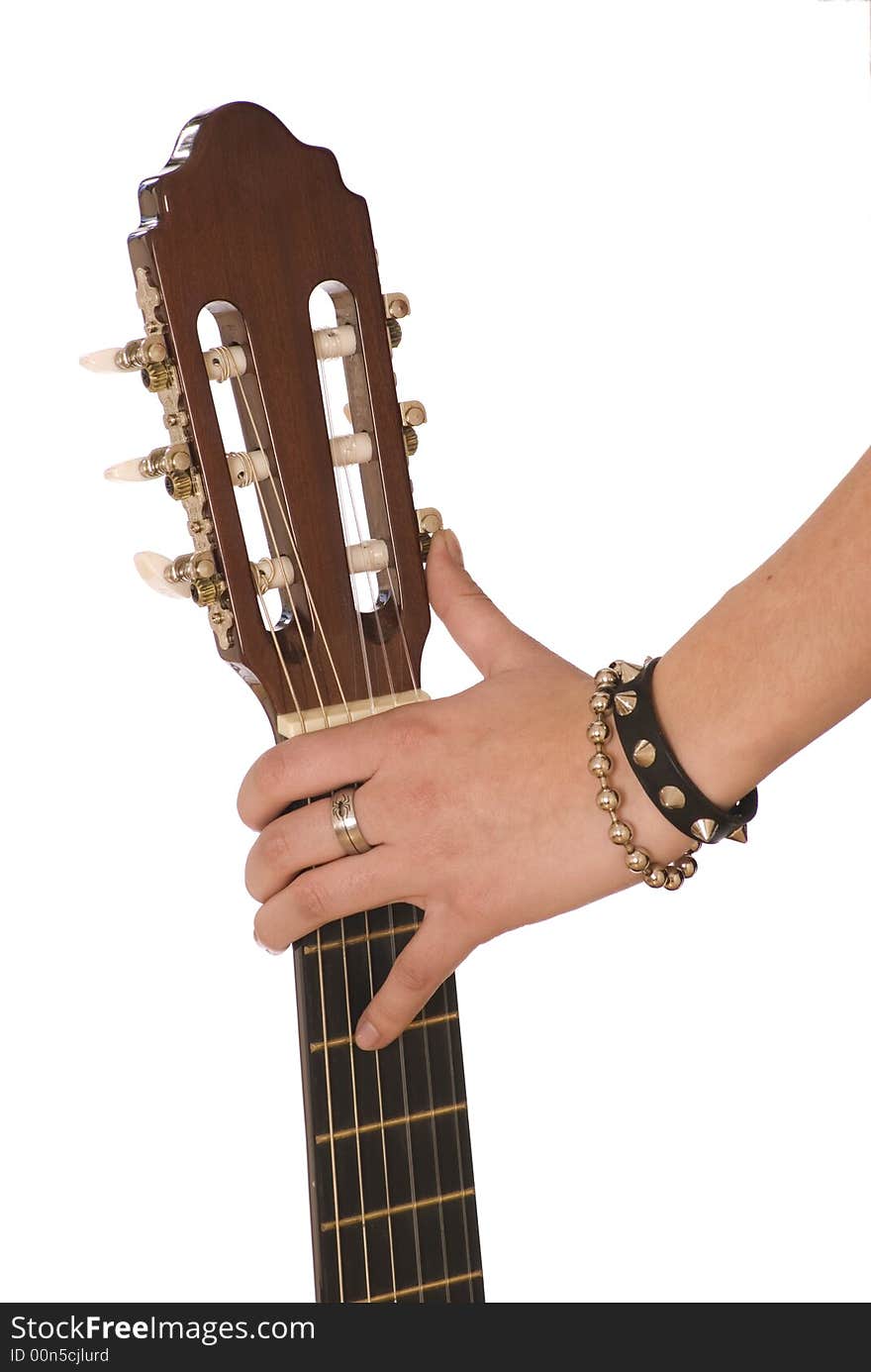 Hand on a signature stamp of a guitar