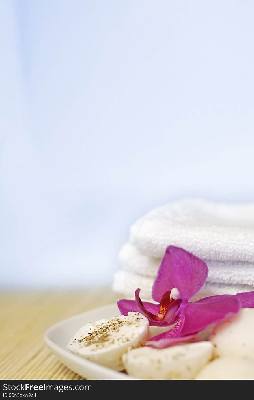 Natural oil soaps with orchid flower and white towel. Natural oil soaps with orchid flower and white towel