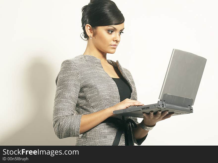 Brunet Business woman with laptop