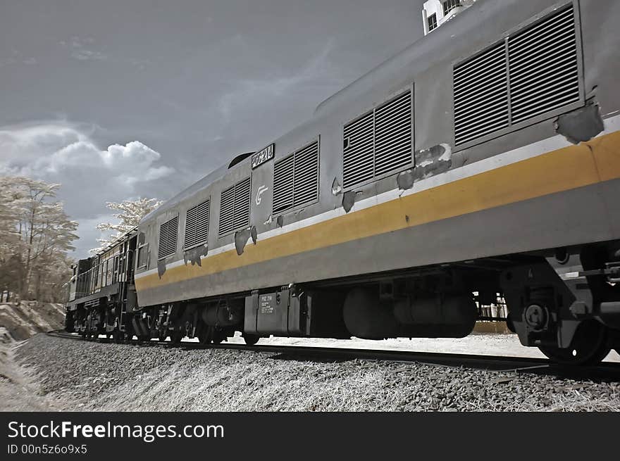 Infrared photo- tree, skies and train