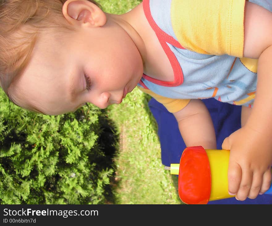 One little boy is learning drink. One little boy is learning drink