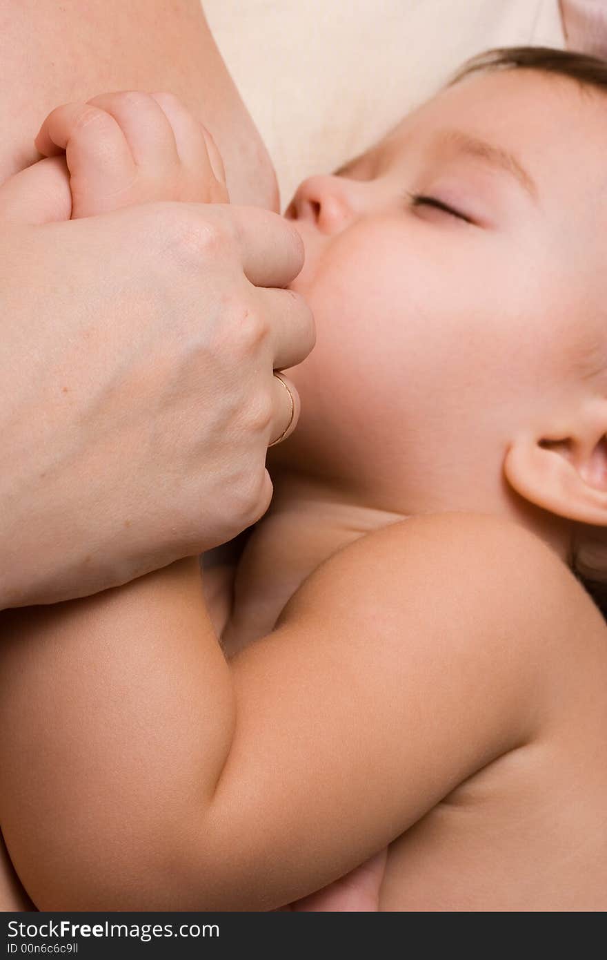 Little kid sleeping and breast-feed. Little kid sleeping and breast-feed