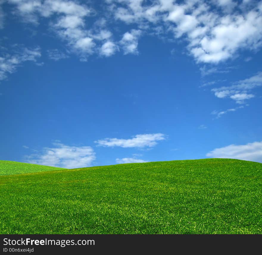 Grass Hill with bright blue sky, a great spring day. Grass Hill with bright blue sky, a great spring day