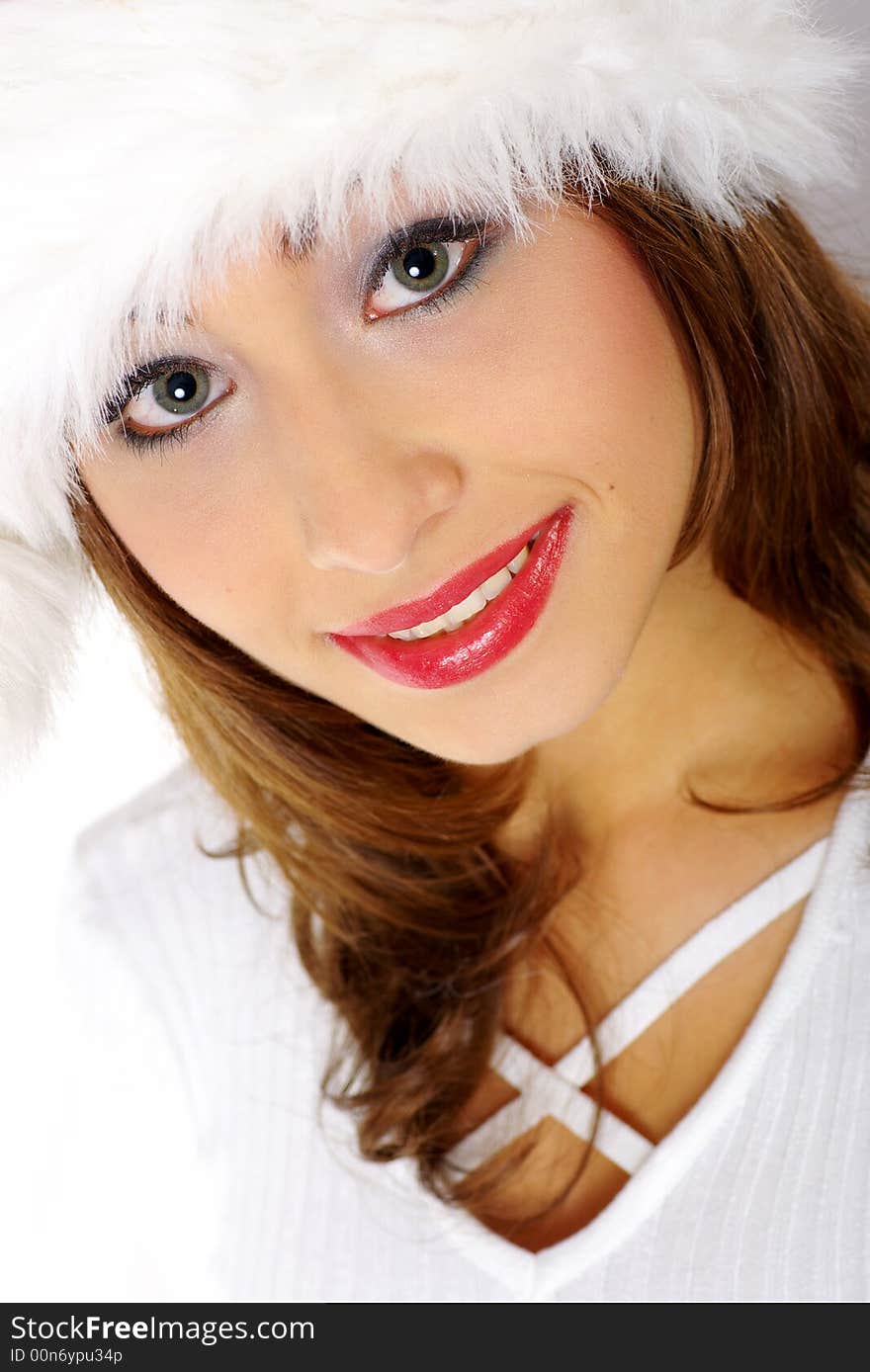 Winter portrait of a beautiful young smiling woman. Winter portrait of a beautiful young smiling woman