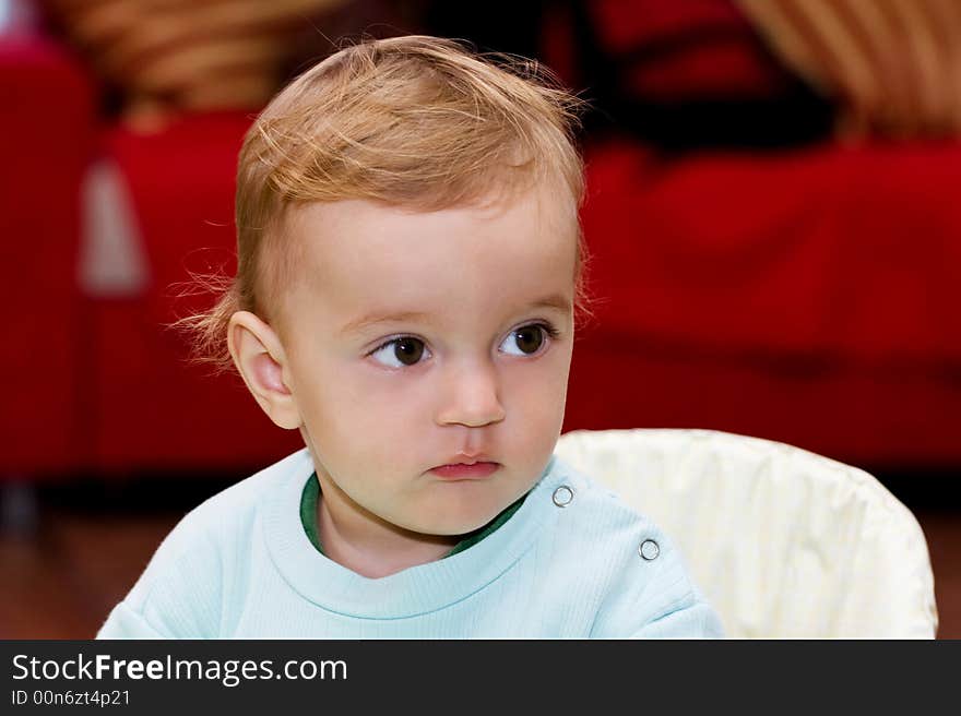 Blond child portrait over red background. Blond child portrait over red background